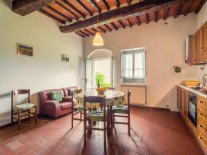 A kitchen or kitchenette at Aesthetic Farmhouse in Bucine with Barbecue