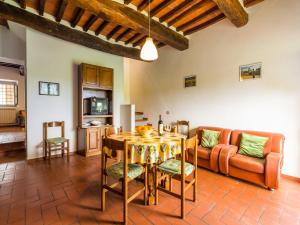 A seating area at Aesthetic Farmhouse in Bucine with Barbecue