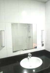 Koupelna v ubytování golden tulip essential owerri