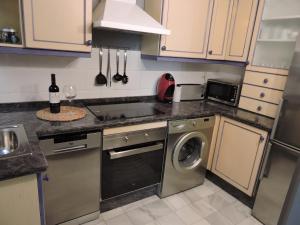 Kuchyň nebo kuchyňský kout v ubytování Precioso Apartamento en el Centro + 8 fotografií