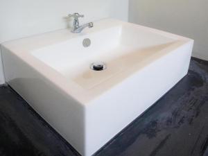 a white sink in a bathroom at Baan Kula Mahasarakam in Maha Sarakham +74 photos