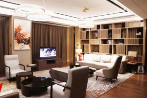 TV a/nebo společenská místnost v ubytování Swisstouches Hotel Ankang
