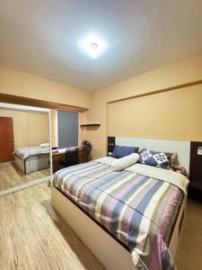 Postel nebo postele na pokoji v ubytování Apartement Mahogany By Kalandra