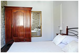 Postel nebo postele na pokoji v ubytování Guest House Tragurion
