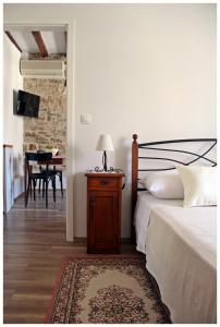 Postel nebo postele na pokoji v ubytování Guest House Tragurion