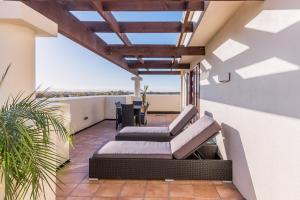 A seating area at Fino Hotel & Suites