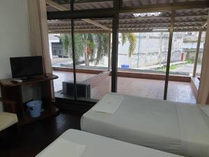 Кровать или кровати в номере SA hotel