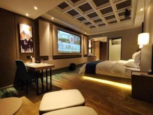 Postel nebo postele na pokoji v ubytování GreenTree Eastern Hotel Changge Yiwu City + 216 fotografií