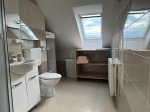 Koupelna v ubytování Apartments Zupan