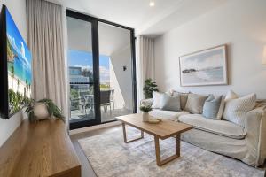 Posezení v ubytování Trendy 1-Bed Retreat in Fremantle with Rooftop + 34 fotografií