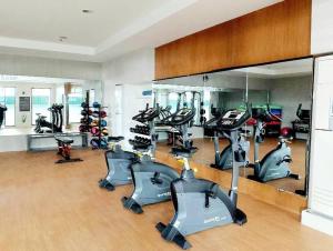 a gym with several treadmills and elliptical machines at Preum Properties Tagaytay in Tagaytay