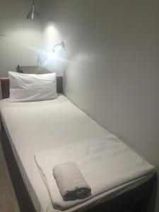 Postel nebo postele na pokoji v ubytování Chaba Chalet Hotel