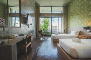 TV a/nebo společenská místnost v ubytování Lumphawa Amphawa Resort