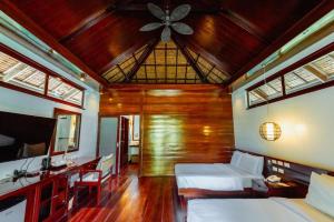 TV a/nebo společenská místnost v ubytování Isla Cabana Resort