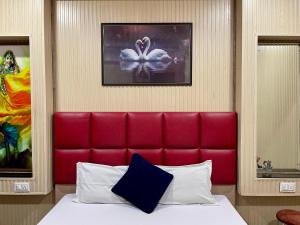 Postel nebo postele na pokoji v ubytování Hotel Raj