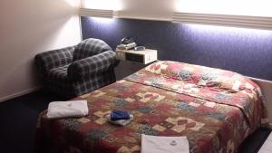 Postel nebo postele na pokoji v ubytování Herbert Valley Motel