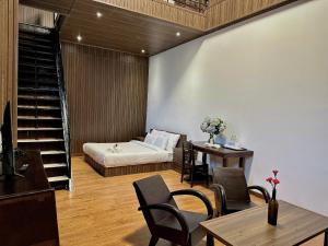 Posezení v ubytování Moc Nha Minh Hotel Da Lat