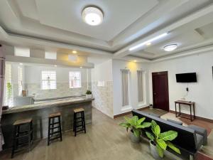 TV a/nebo společenská místnost v ubytování Canopy Residence