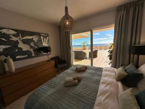 Posteľ alebo postele v izbe v ubytovaní Apartments Bermuda Beach