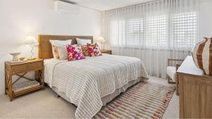 Postel nebo postele na pokoji v ubytování Talinga 1 - Hill side charm