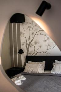 Cama ou camas em um quarto em Hotel Kalloni