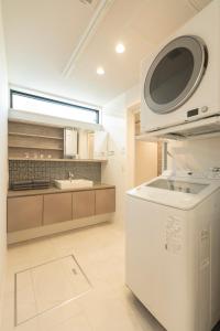 Kuchyň nebo kuchyňský kout v ubytování -Mova Villa Koshi Daiwa 2-近阿蘇 熊本城 各類溫泉 台積電 合志獨棟民宿 體驗當地生活