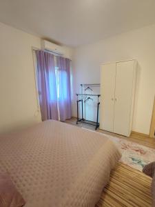 Postel nebo postele na pokoji v ubytování Apartment Oscar
