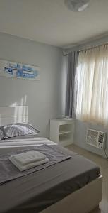 Ένα ή περισσότερα κρεβάτια σε δωμάτιο στο One oasis 3rdfloor with balcony 2br