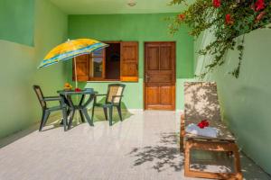 A patio or other outdoor area at Zorbas Rooms