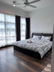 Giường trong phòng chung tại Family Holiday Apartment