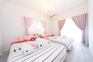 Letto o letti in una camera di Miraie Yokkaichi Higashihino