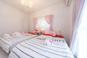 Letto o letti in una camera di Miraie Yokkaichi Higashihino