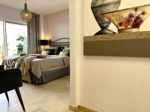 Posteľ alebo postele v izbe v ubytovaní Apartments Bermuda Beach