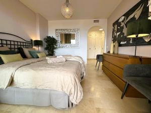Posteľ alebo postele v izbe v ubytovaní Apartments Bermuda Beach