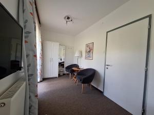 TV in/ali zabaviščno središče v nastanitvi Volenter Gästehaus