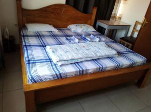 En eller flere senge i et værelse på Happy Stay Home