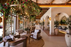 Reštaurácia alebo iné gastronomické zariadenie v ubytovaní Hotel Riu Palace La Mola