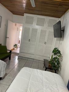 TV a/nebo společenská místnost v ubytování Apartamento Adriana