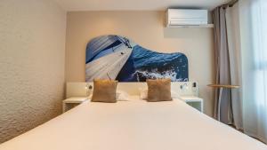 Кровать или кровати в номере Hotel Europe