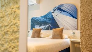 Кровать или кровати в номере Hotel Europe