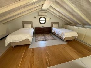 Postel nebo postele na pokoji v ubytování Derya Beach Apartment