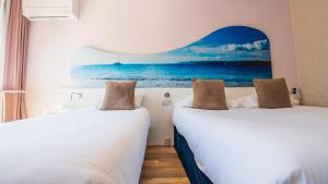 Кровать или кровати в номере Hotel Europe