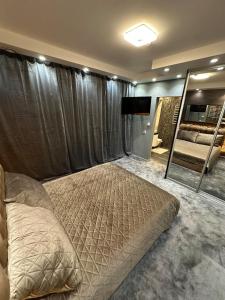 Postel nebo postele na pokoji v ubytování B&M Romantic room Self check-in