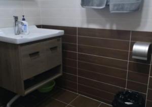 Ванна кімната в Boxianyuan Three-Bedroom Apartment
