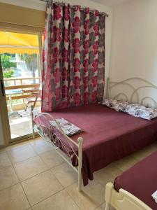 Postel nebo postele na pokoji v ubytování Toroni House!