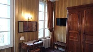 TV a/nebo společenská místnost v ubytování Hotel Montsegur