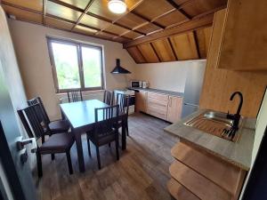 Kuchyň nebo kuchyňský kout v ubytování Apartmány ŠTĚSTÍ