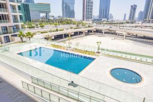 Swimmingpoolen hos eller tæt på Bloomfields Stylish 1br In Al Maryah Vista