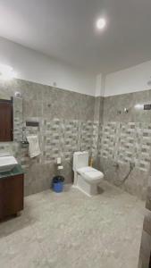 Ένα μπάνιο στο Hotel Summer Inn