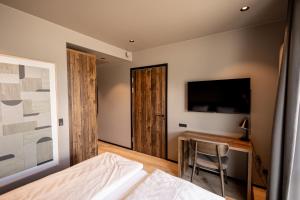 Postel nebo postele na pokoji v ubytování Hotel Melfarhus